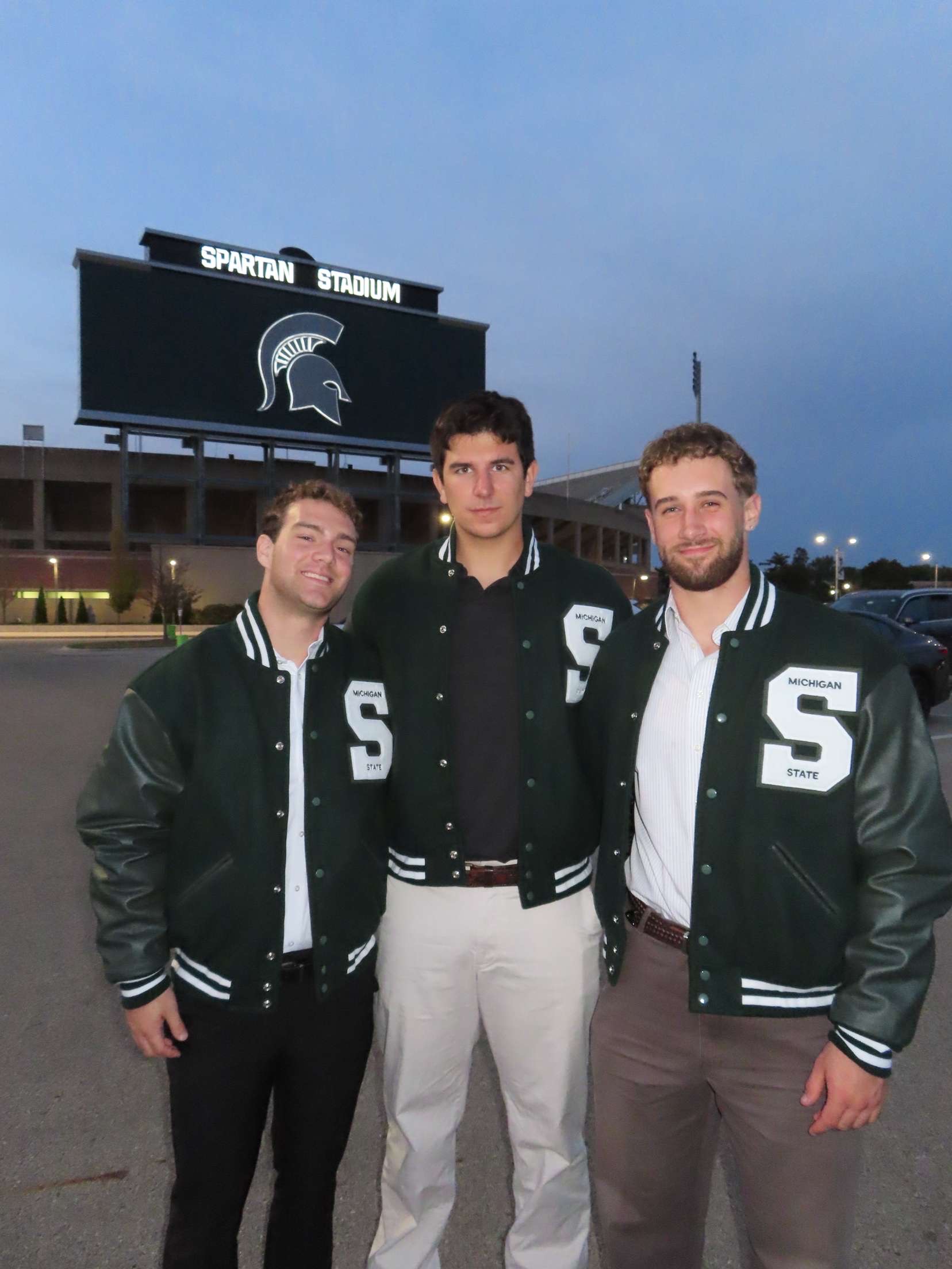 Brendan wearing a letter jacket